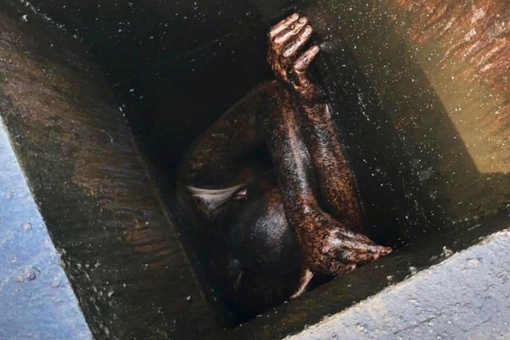 San Francisco firefighters rescued a man who was trapped in the roof grease vent of a vacant Chinese restaurant. Photo: Alameda County Sheriff's Office via TNS