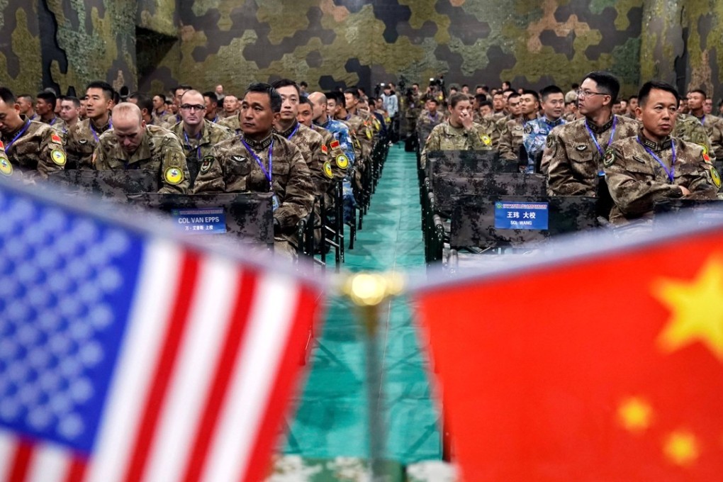US and Chinese military personnel attend the closing ceremony of a “disaster management exchange” near Nanjing last month. A PLA scholar says the two countries have failed to properly define their relations. Photo: Reuters
