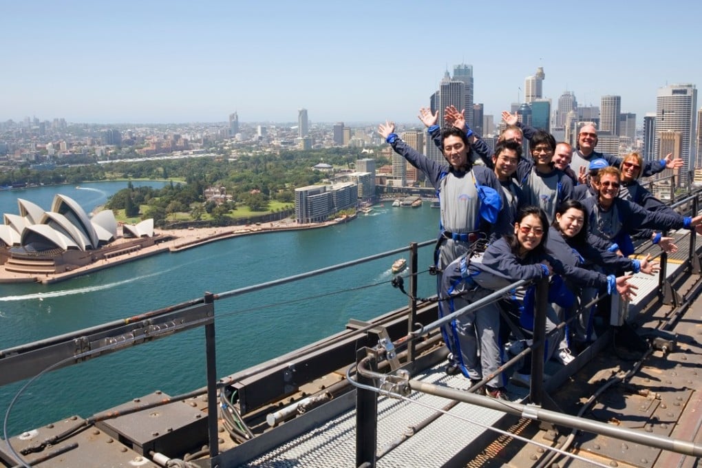 Climbers atop the Sydney Harbour Bridge. Picture: Alamy