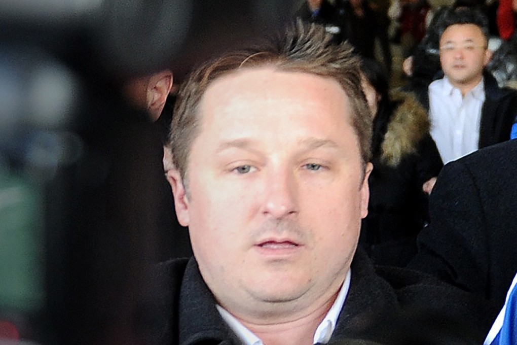 Michael Spavor arrives in Beijing with former US basketball player Dennis Rodman (not pictured) following a visit to North Korea in 2014. Photo: AFP