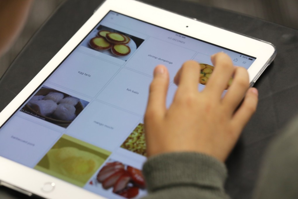 A student uses an iPad during a lesson at the YOT Wong Suk Fong Memorial Secondary School, Tuen Mun. Photo: K.Y. Cheng