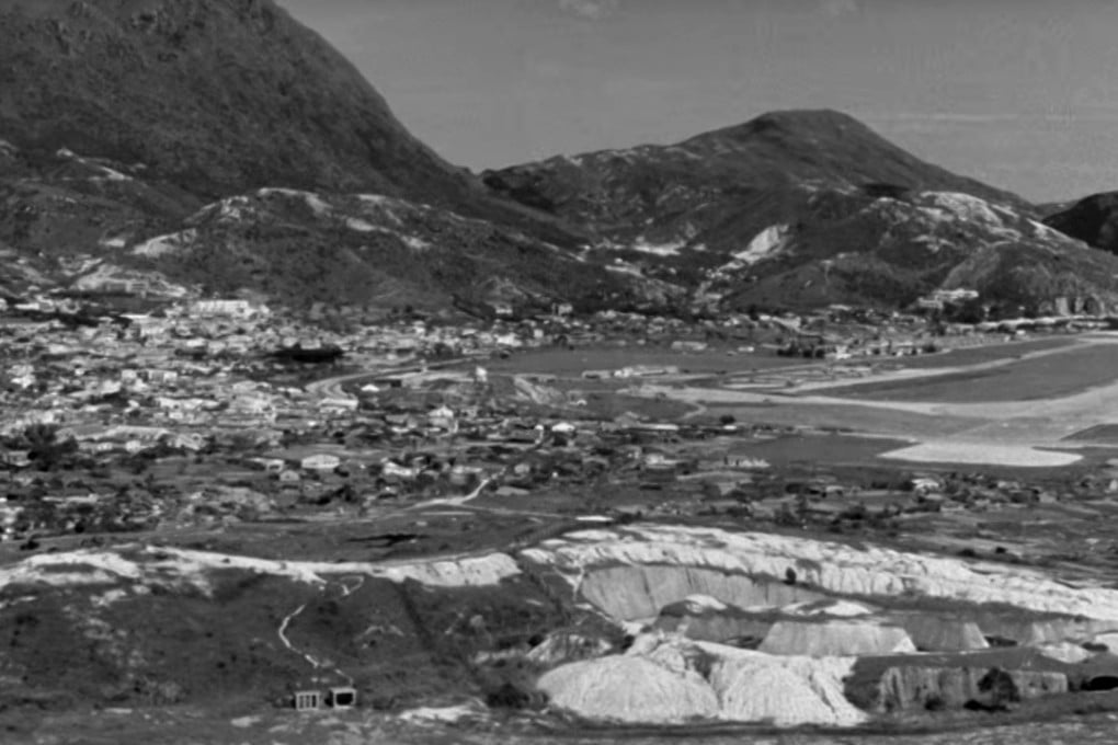 A still from the film The Night My Number Came Up, showing an undeveloped Kowloon on the approach to Kai Tak airport.