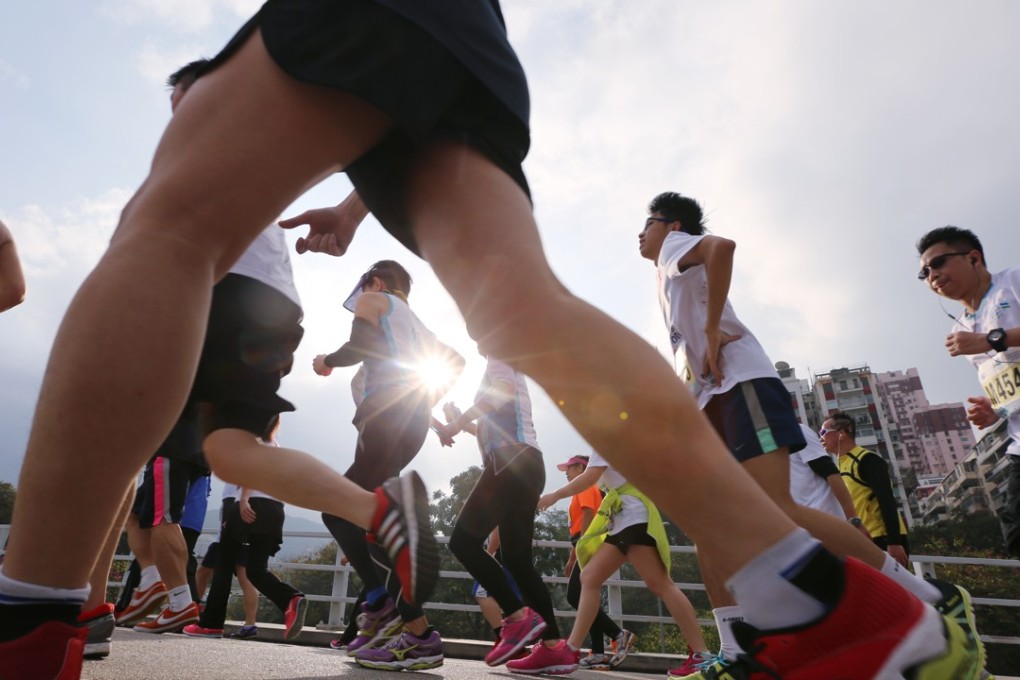 Runners competing in the Standard Chartered Hong Kong 2015 Marathon. Photo: Felix Wong