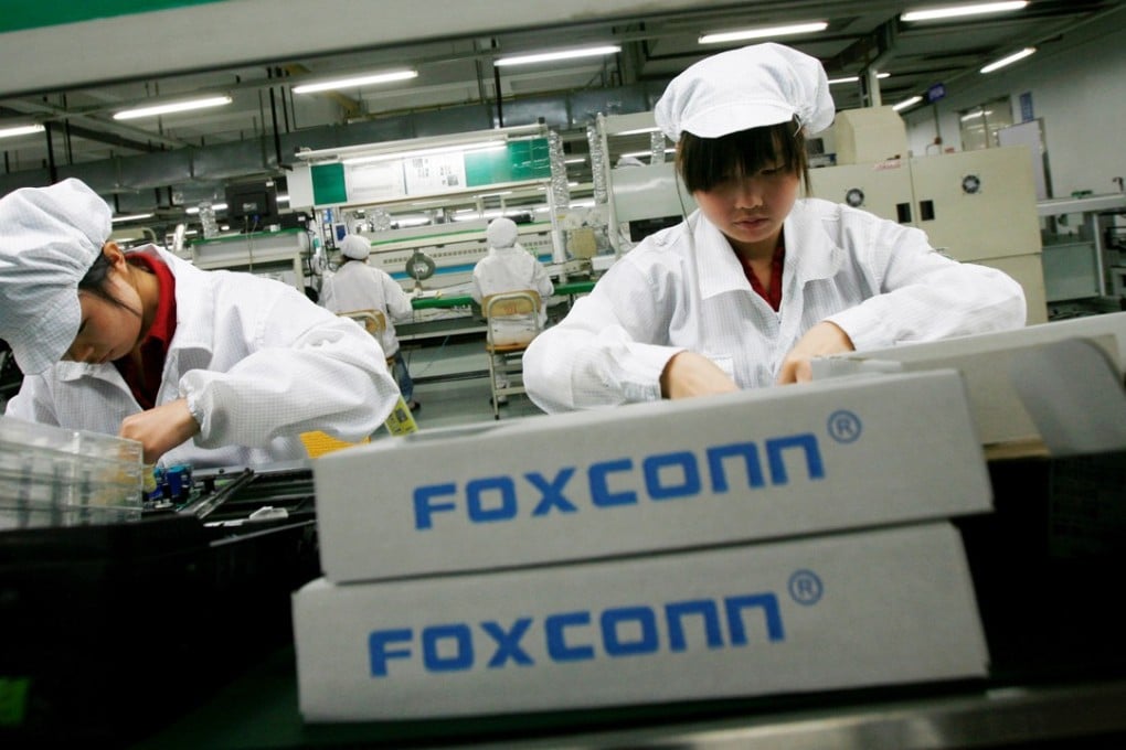 Workers at a Foxconn factory in Longhua, south China’s Guangdong province. Photo: Reuters