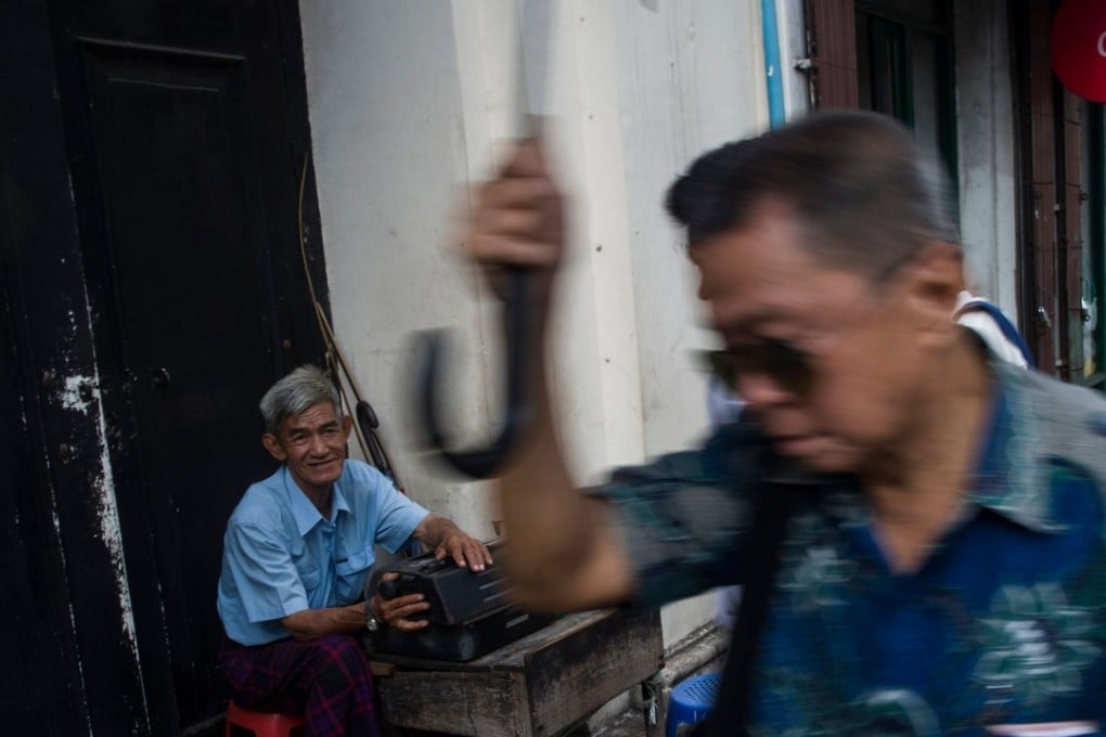 Ear cleaners, roadside plumbers and typewriters for hire cling to the pavements of Yangon's famed Pansodan Street, the beating heart of Myanmar's biggest city where antiquated jobs survive despite unstoppable change. Photo: AFP