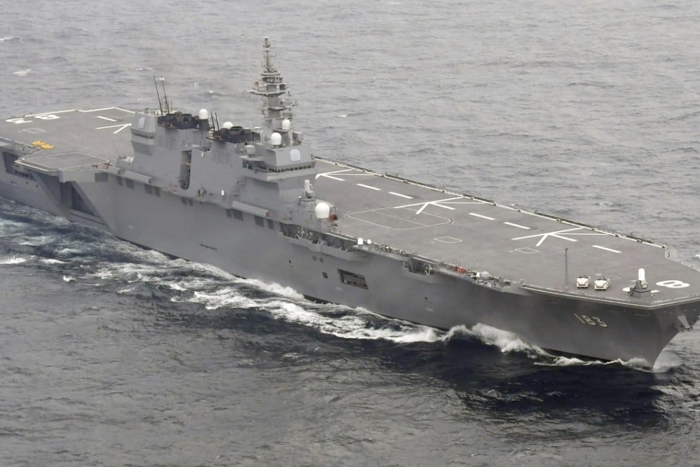 Japan’s plans to “enable fighter jets to be operated from existing warships” would involve refitting the destroyer Izumo to allow the carrying of F35B fighter bombers. Photo: Kyodo News via AP