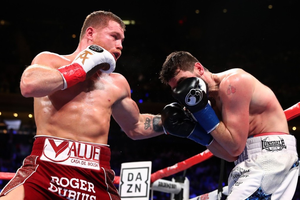 Canelo Alvarez (left) lands a punch against Rocky Fielding during their WBA Super Middleweight title bout at Madison Square Garden. Photo: AFP