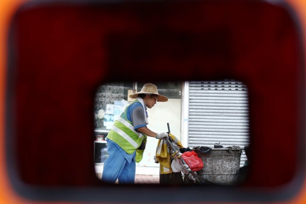 Oxfam said 75 per cent of the government’s contracted workers, such as cleaners, made no more than HK$36.50 an hour. Photo: Nora Tam