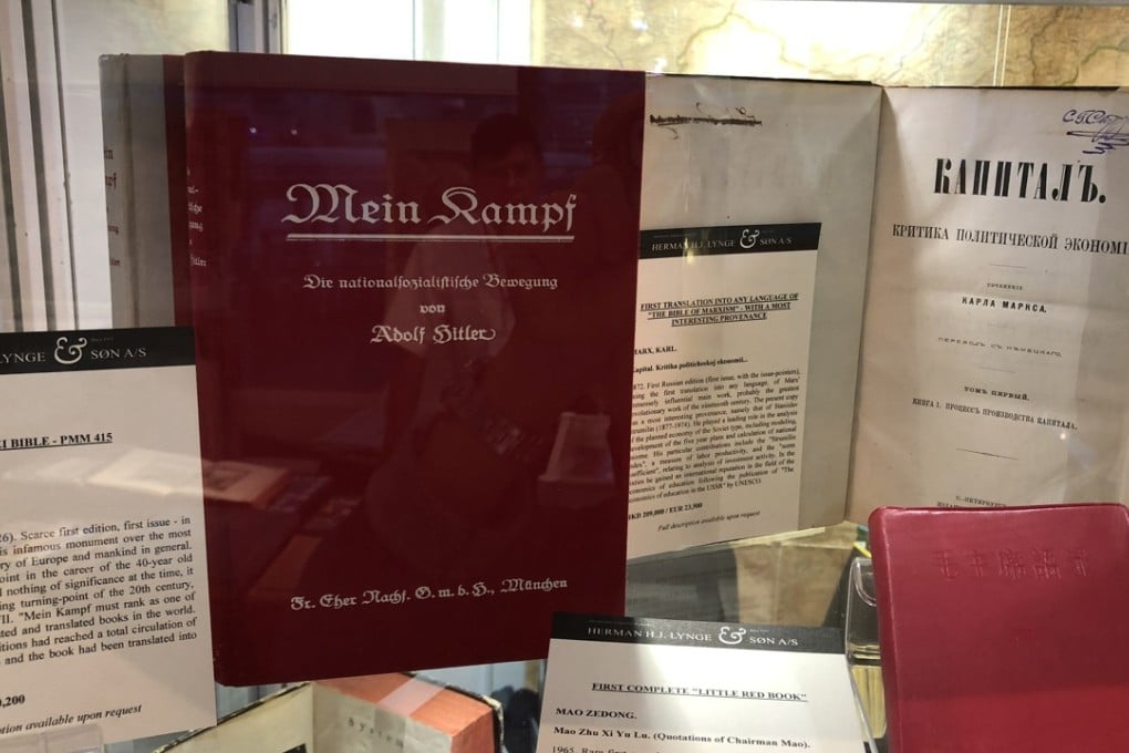 An early copy of Mein Kampf, Adolf Hitler's autobiography, next to Mao Zedong's Little Red Book, at an antiquarian book fair in Hong Kong, in December. Picture: Enid Tsui