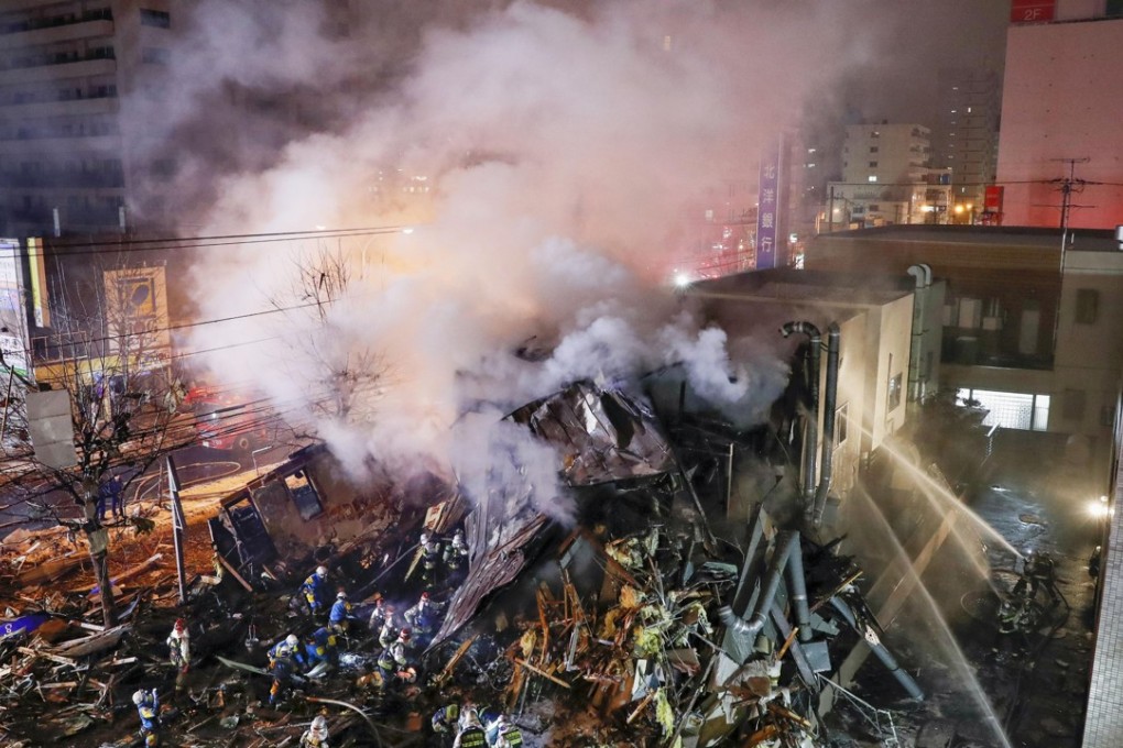 First responders work at the scene of an explosion in Sapporo. Photo: AP