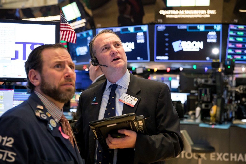 Traders work on the floor of the New York Stock Exchange on December 7. Photo: Bloomberg