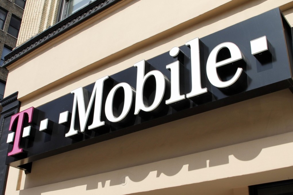 Signage for a T-Mobile store is pictured in downtown Los Angeles, California. Photo: Reuters