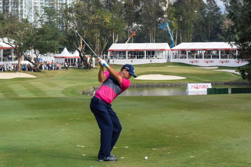 Sergio Garcia hits an approach to the 18th hole at Fanling in 2018. Photo: Richard Castka/sportpixgolf.com