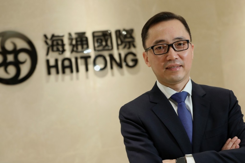 Duke Du Jinsong, managing director of Haitong International Securities Group, says the company will be hiring wealth management advisers to offer customers personalised services. Photo: Nora Tam