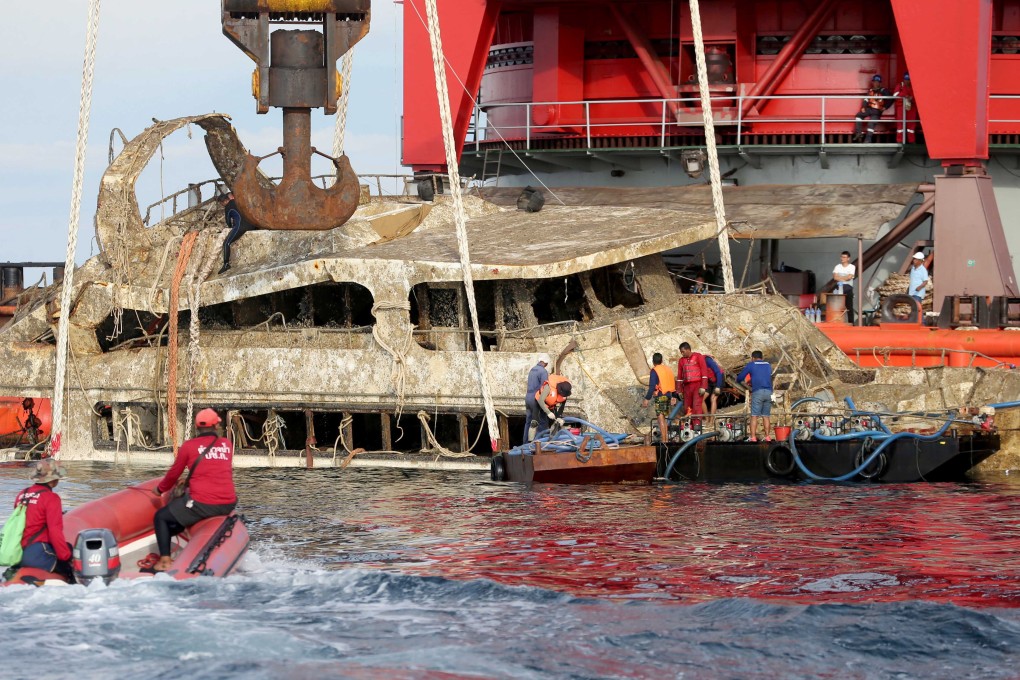 The wreck of the Phoenix is salvaged from the sea floor. Photo: EPA