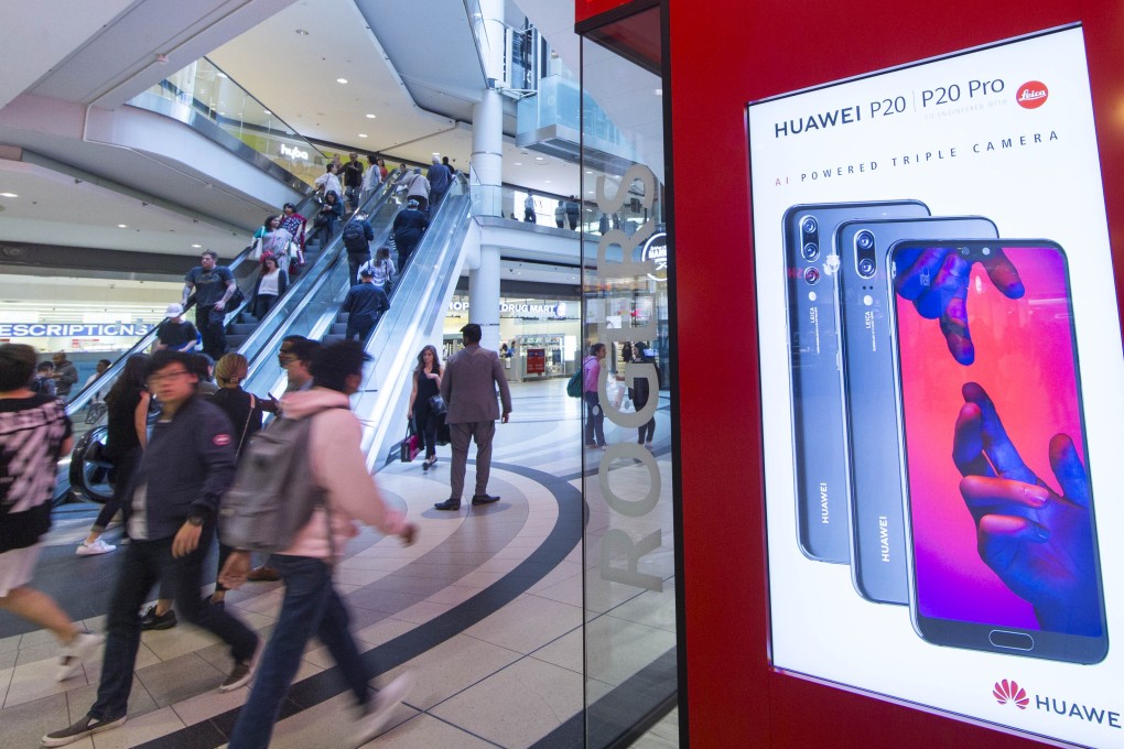 Advertising for the Huawei P20 Series of smartphones is seen at the Eaton Centre in Toronto, Canada, May 17, 2018. Photo: Xinhua