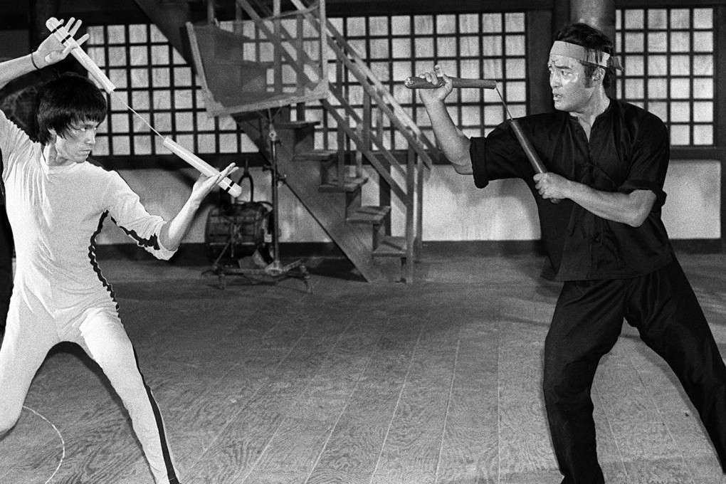 Bruce Lee (left) using nunchuks. Photo: SCMP