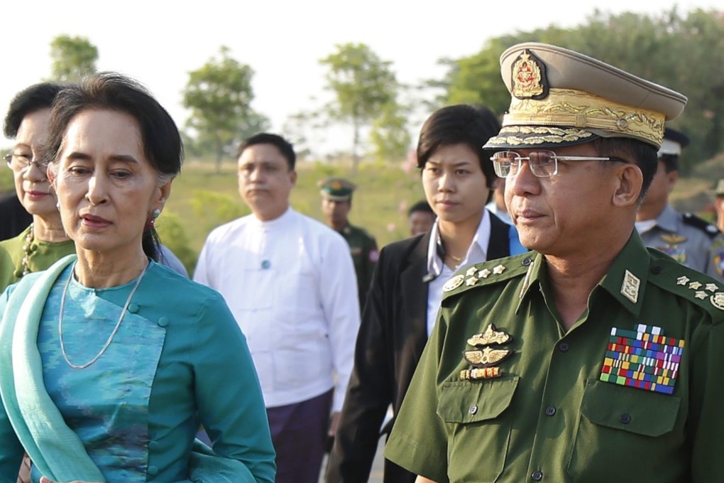 Aung San Suu Kyi and Senior General Min Aung Hlaing. Photo: EPA