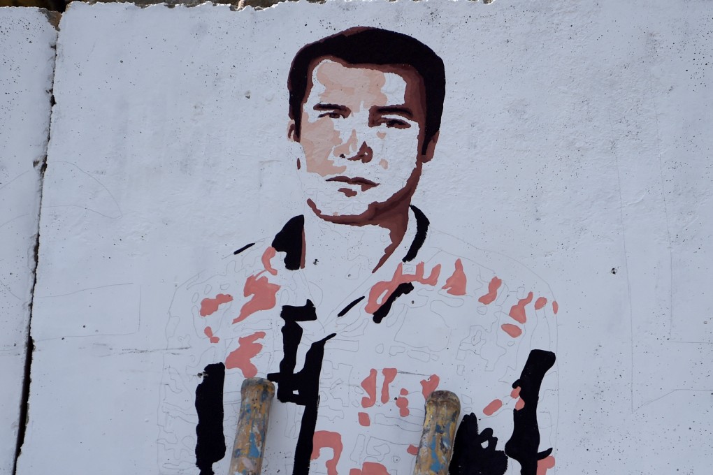 A mural in Kabul of slain photographer Shah Marai. Photo: AFP