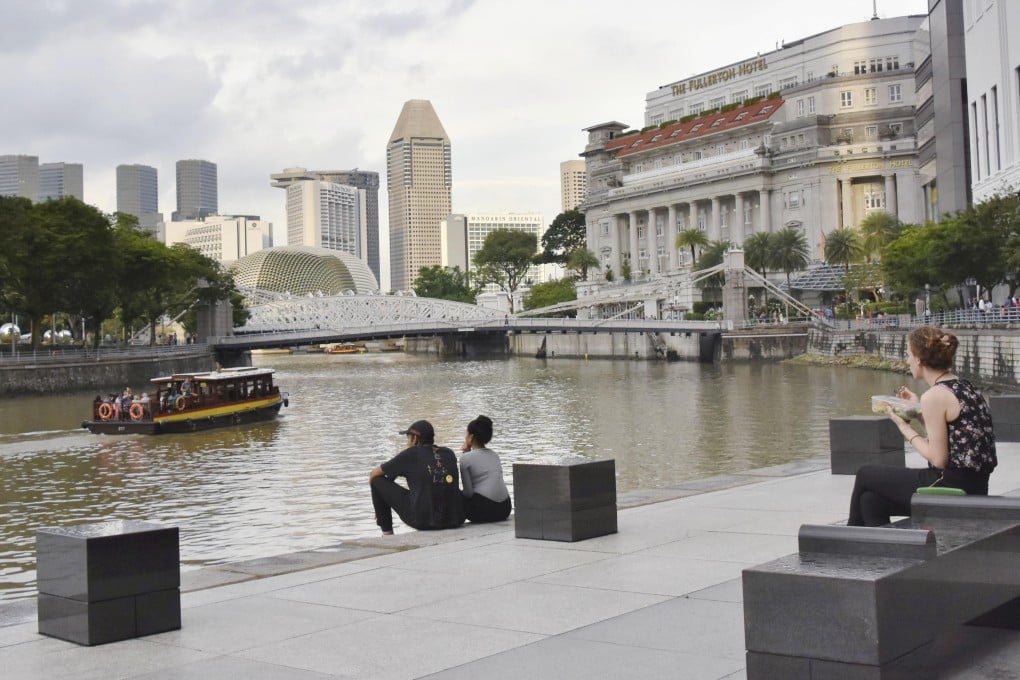 Singapore has developed a very comprehensive and robust social security system, covering housing, health care, education and retirement – all of which remain top concerns in China. Photo: Kyodo.