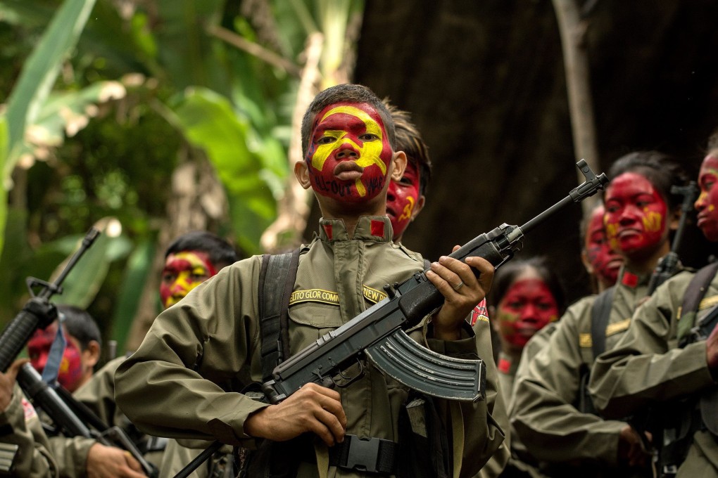 Guerillas of the New People's Army in the Sierra Madre mountain range. Photo: AFP