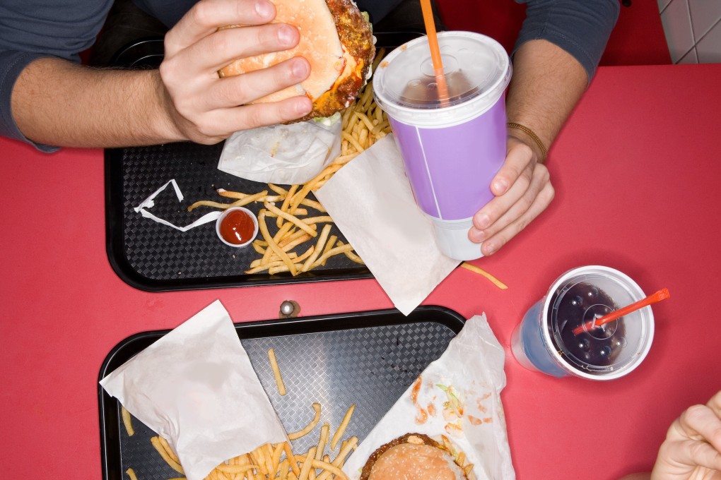 New research has shown that lack of sleep is related to cravings for junk food the next day. Photo: Alamy