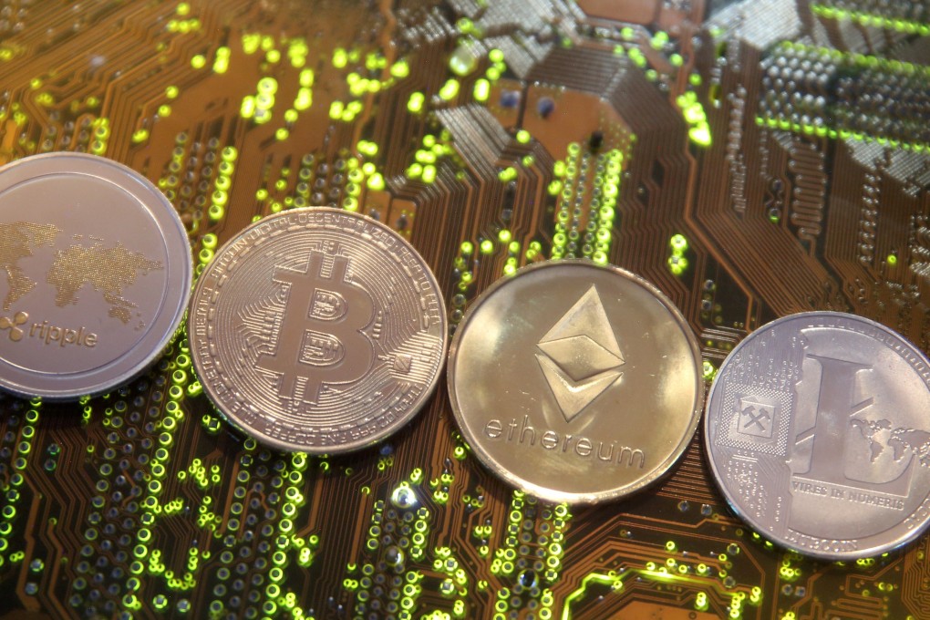 Representations of the ripple, bitcoin, ethereum and litecoin virtual currencies on a personal computer motherboard. The recent explosion of nearly 2,000 cryptocurrencies in a largely unregulated environment has greatly expanded the scope for abuse in the trading of these digital assets, according to a new study. Photo: Reuters