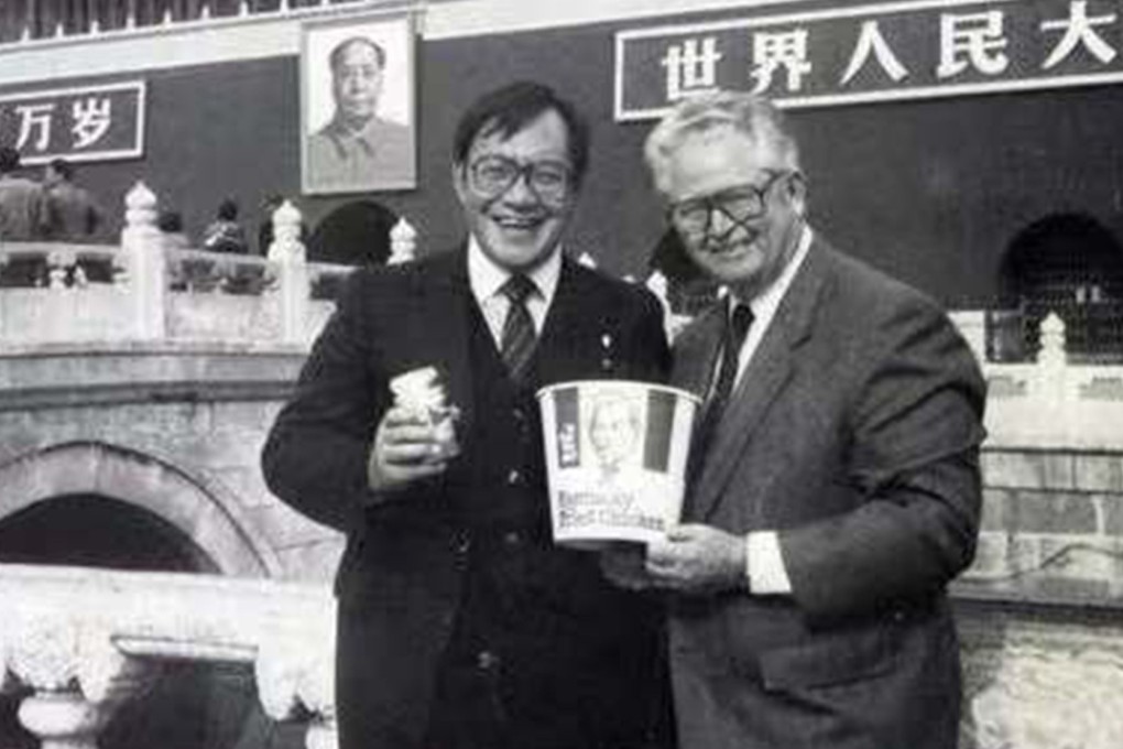 Tony Wang (left) with Peter Harman, the first global franchisee of KFC, in Beijing.