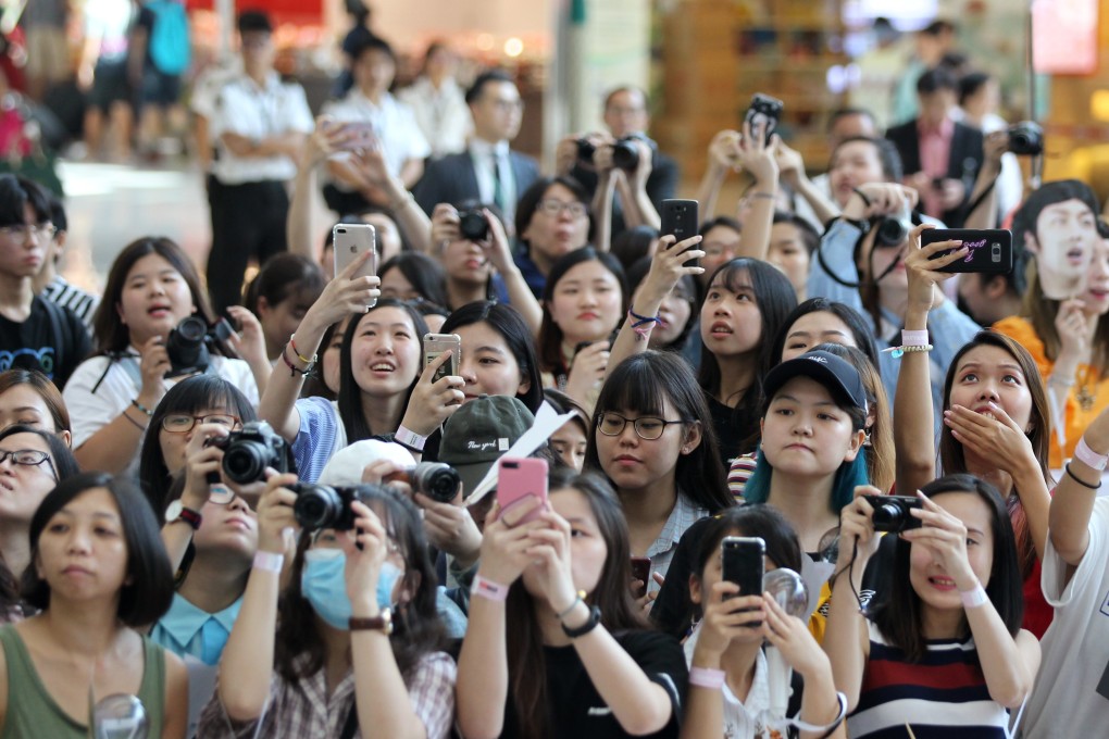 K-pop fans at Hong Kong International Airport. Photo: Roy Issa