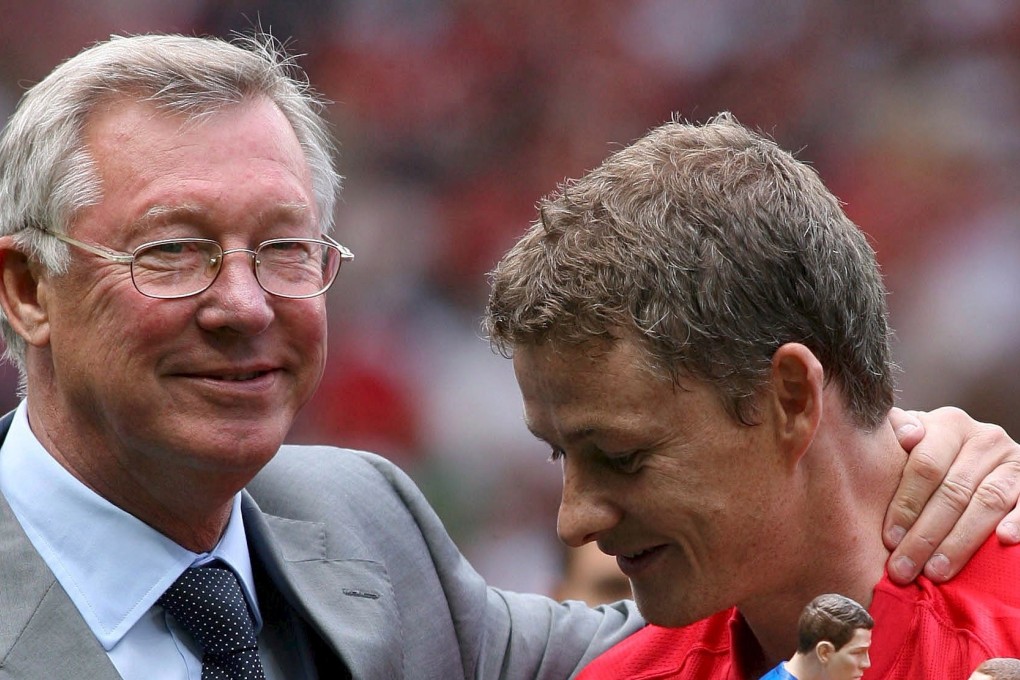 Ole Gunnar Solskjaer is embraced by his former manager Alex Ferguson (left) before his testimonial against Espanyol at Old Trafford August 2008. Solskjaer has been named caretaker manager of Manchester United until the end of the season. Photo: EPA