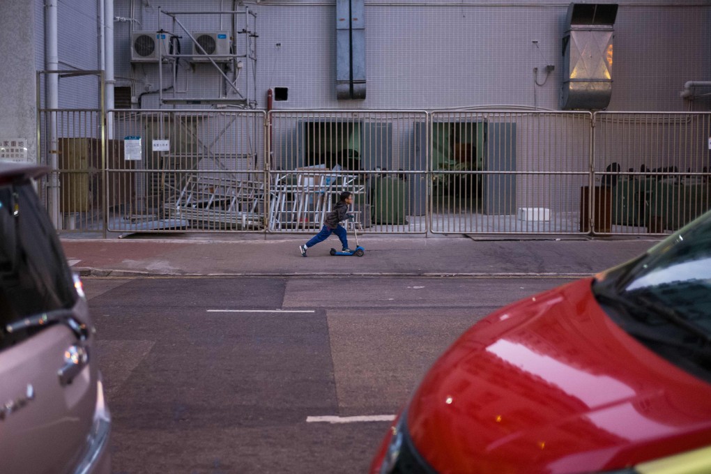 A young boy has fun with a scooter in Hong Kong. The definition of success and how Hong Kong rewards effort has changed, yet the younger generations are being unfairly labelled lazy and weak for wanting something different. Photo: AFP