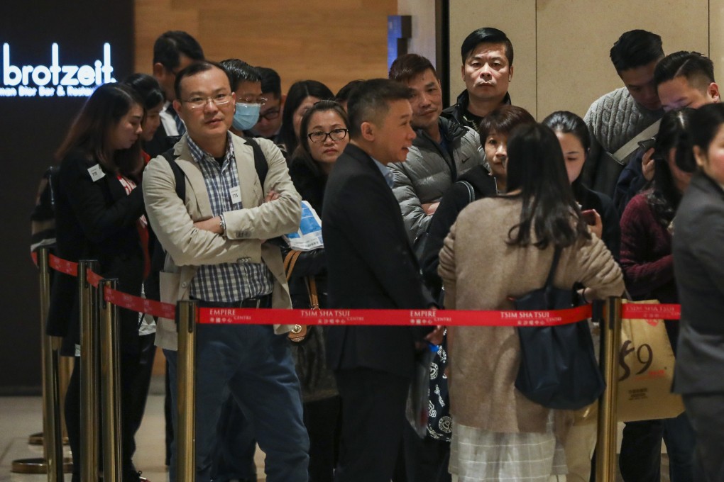 Prospective homebuyers queue for the Grand Central exhibition on December 18, 2018. Photo: Nora Tam