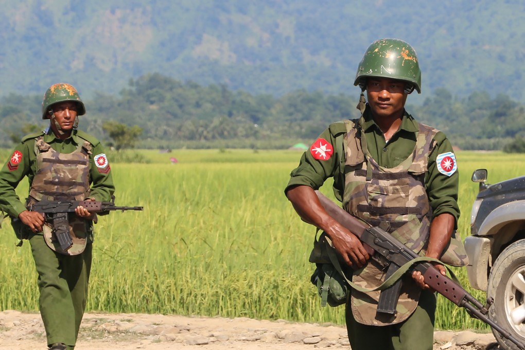 A file photo of Myanmar army soldiers patrolling a village in Rakhine State. Photo: AFP