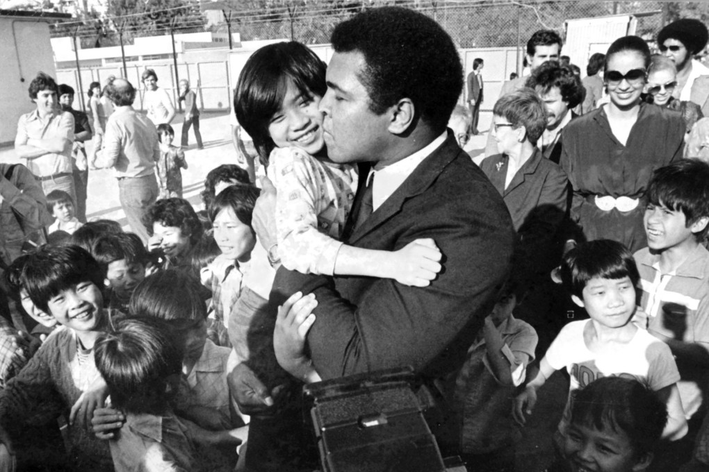 Muhammad Ali visits the Kai Tak East Refugee Transit Centre on December 22, 1979. Picture: SCMP