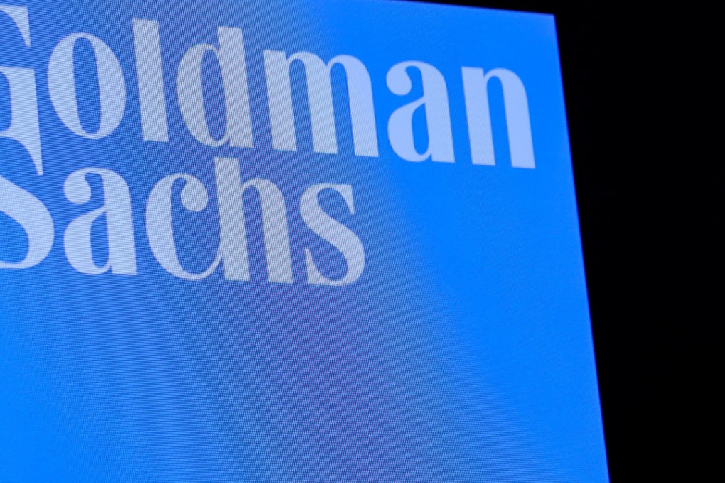 The ticker symbol and logo for Goldman Sachs is displayed on a screen on the floor at the New York Stock Exchange. Photo: Reuters