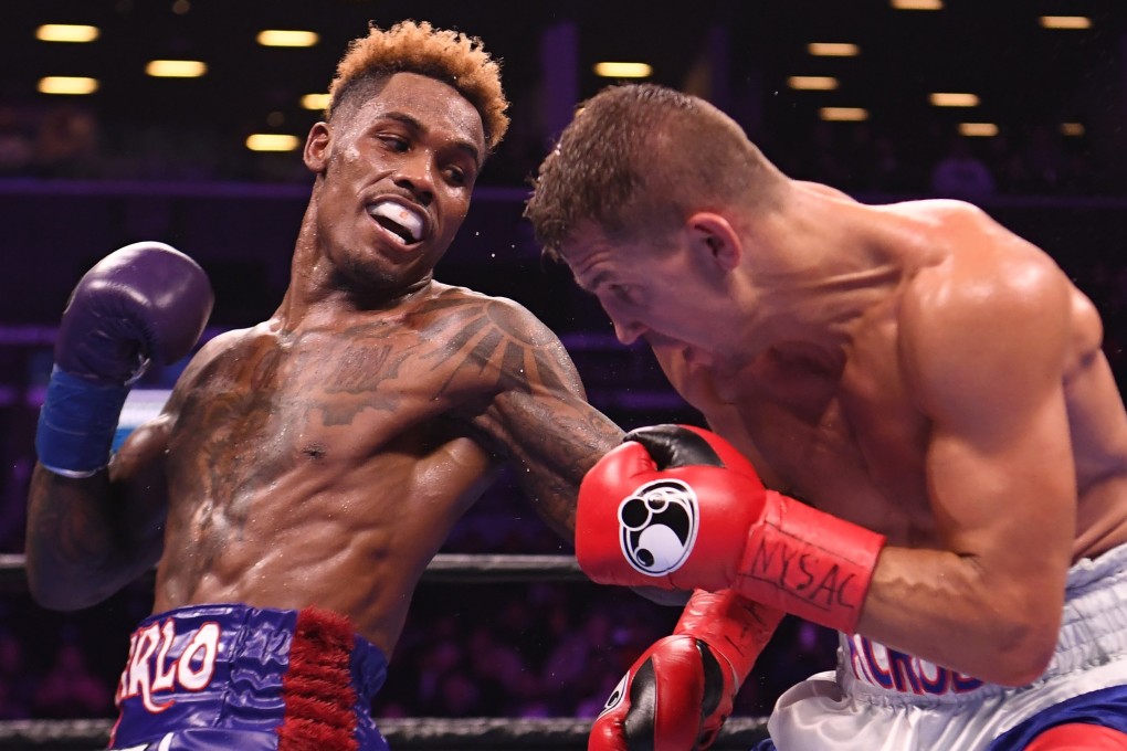Jermall Charlo punches Matt Korobov during his win in their WBC interim middleweight championship title bout at Barclays Centre, New York. Photo: AFP
