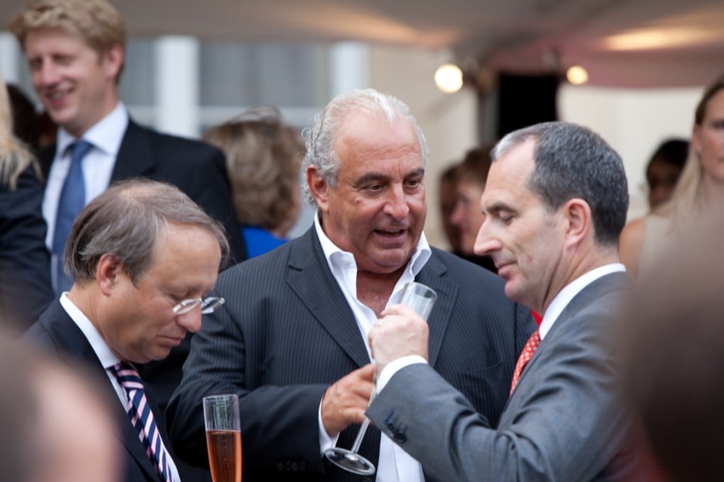 Top Shop fashion chain boss Sir Philip Green wearing one of his informal suits.