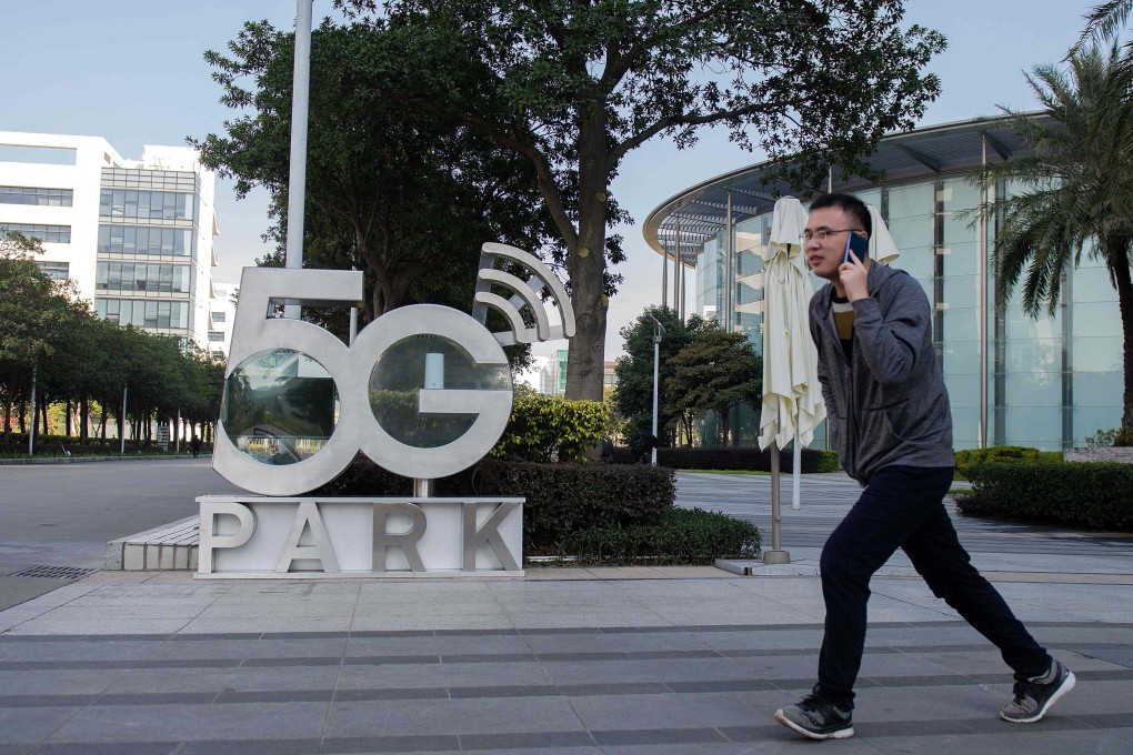 A man walks past Huawei’s global headquarters in Shenzhen. The company faced tough prospects in its overseas markets after the US put pressure on its closest allies to block the Chinese company from participating in 5G mobile network projects due to security concerns. Photo: AFP