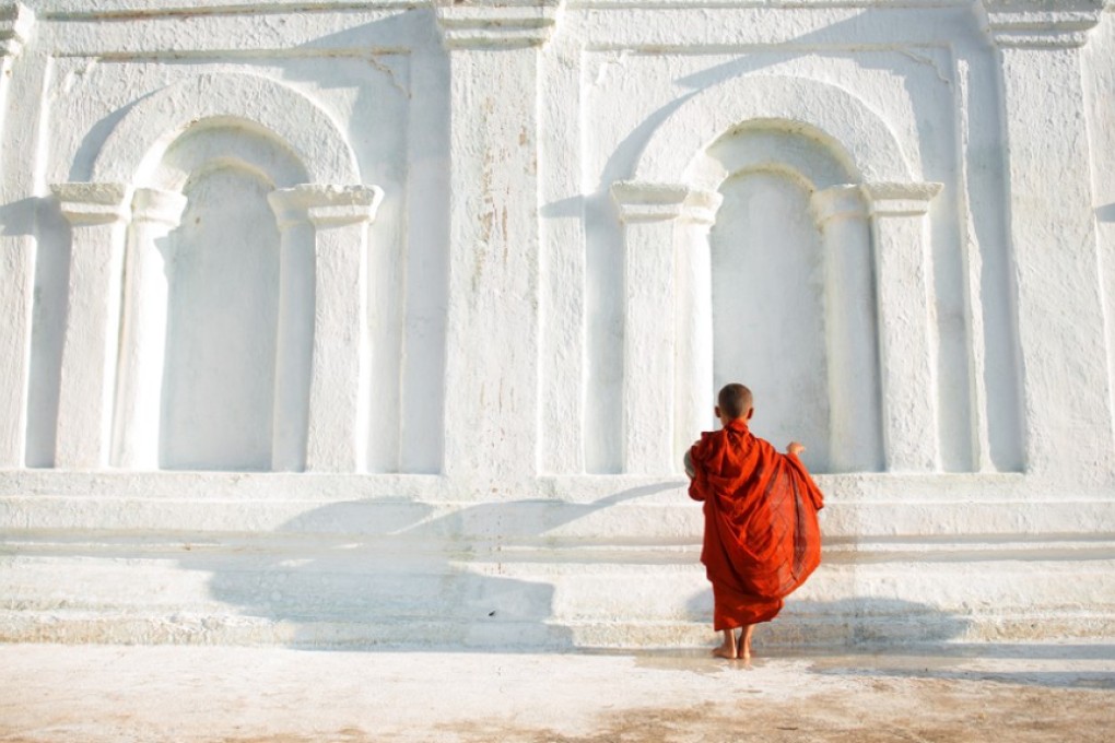 A young Buddhist monk in Myanmar. Not surprisingly, Buddhist themes and the monastic life feature in The Long Road to Wisdom, a collection of Burmese folk tales. Photo: Shutterstock