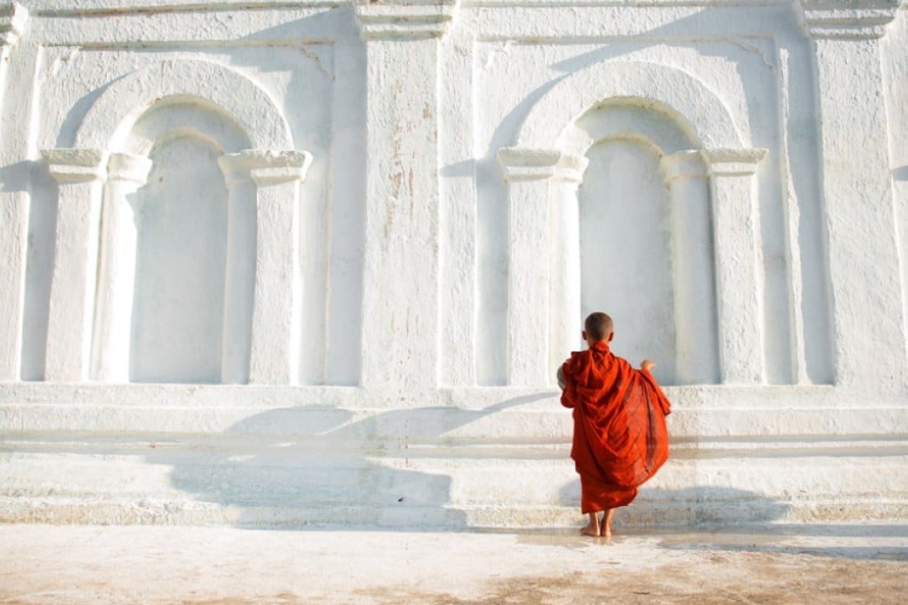 A young Buddhist monk in Myanmar. Not surprisingly, Buddhist themes and the monastic life feature in The Long Road to Wisdom, a collection of Burmese folk tales. Photo: Shutterstock