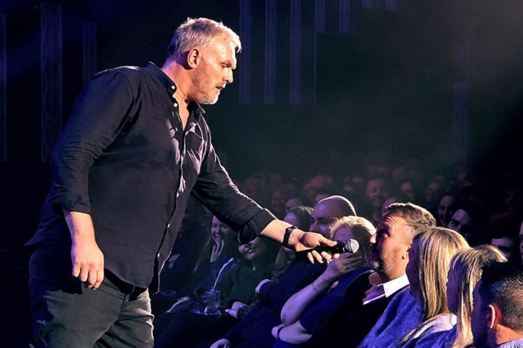 British comedian Greg Davies works the crowd during his Netflix show.