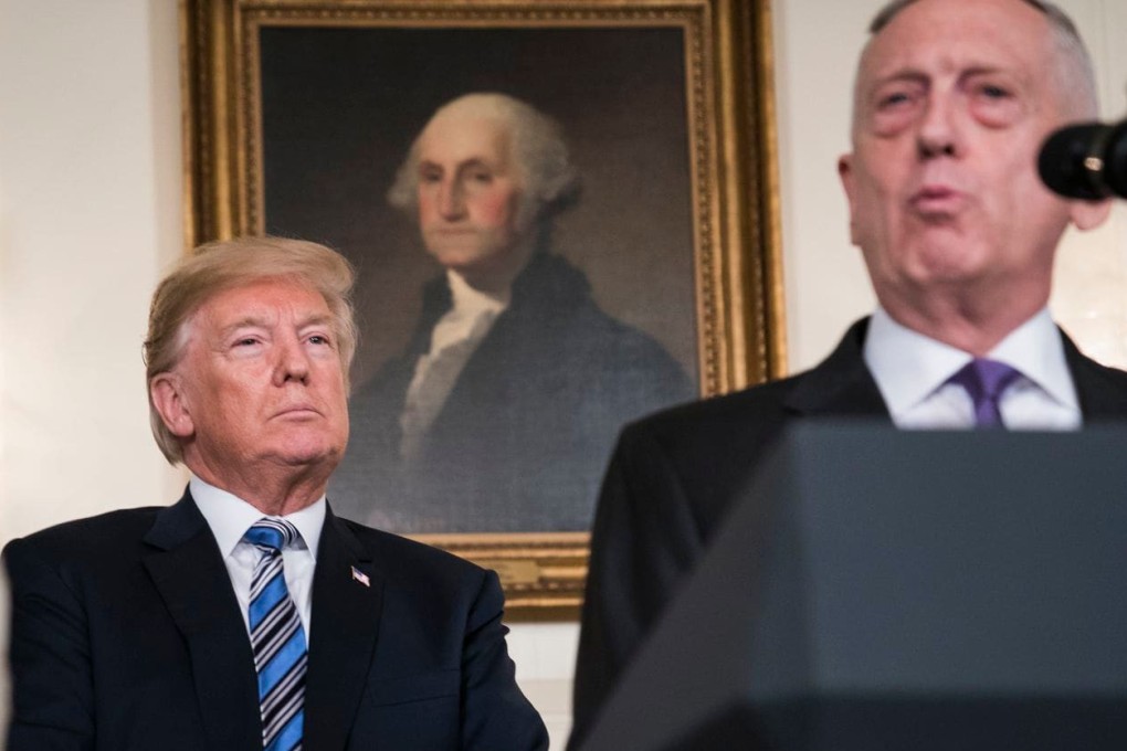 President Donald Trump listens to former defence secretary James Mattis, who quit after the president abruptly announced the withdrawal of troops from Syria. Photo: The Washington Post