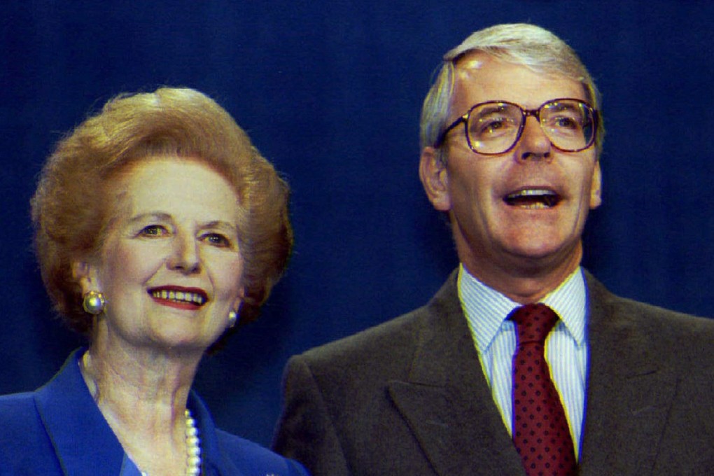 Margaret Thatcher with her successor and prime minister at the time John Major at a Conservative Party conference in October 1994. Photo: Reuters