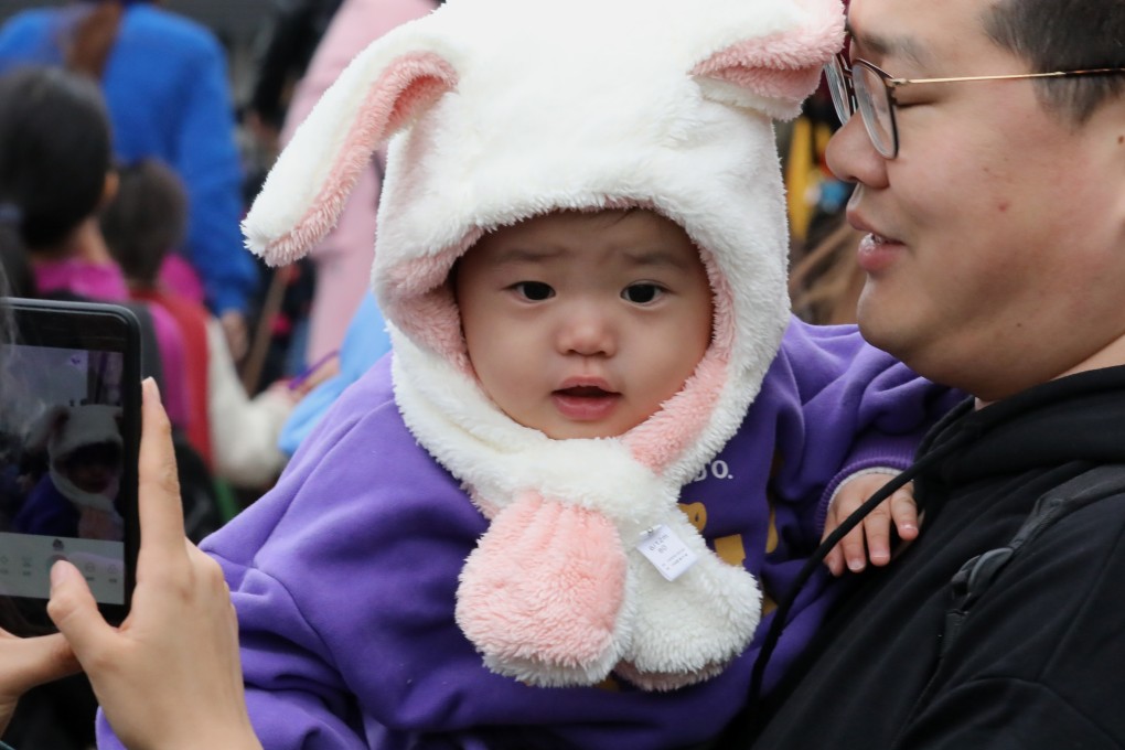 A child well wrapped for the winter weather in Tsim Sha Tsui earlier this month. Photo: K.Y. Cheng