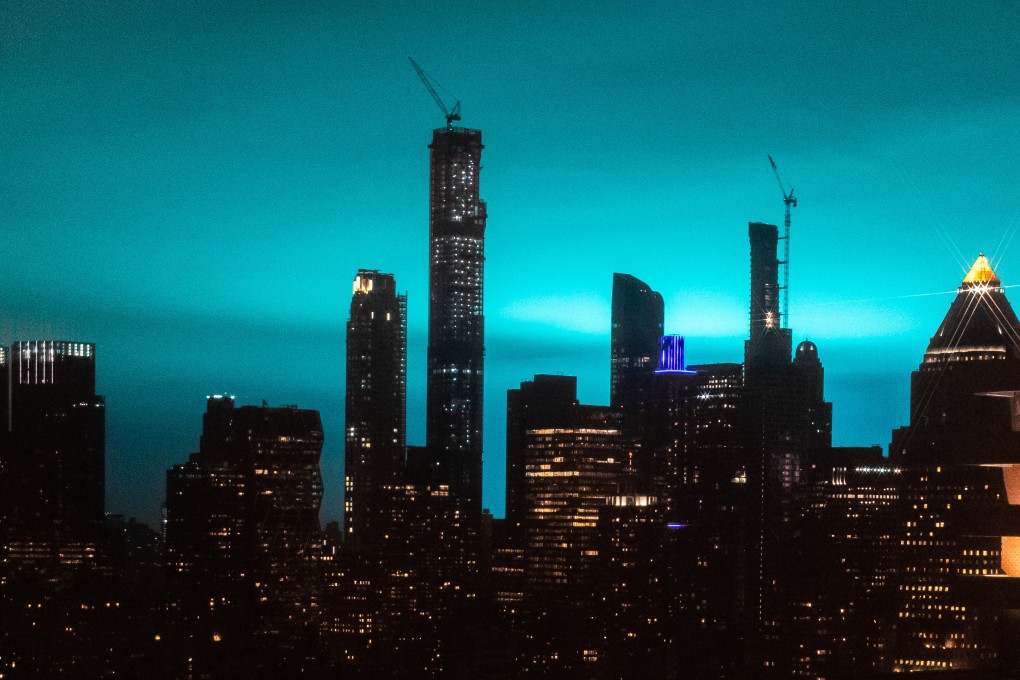 The night sky over New York is bathed in blue light on December 27, 2018. Photo: Bloomberg
