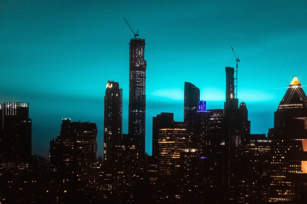 The night sky over New York is bathed in blue light on December 27, 2018. Photo: Bloomberg