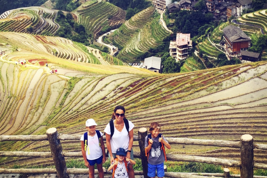 Cecile Pont and her children in Rice fields in Guilin, China.