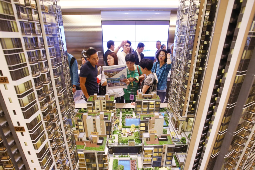 Potential buyers visit the sales office of One Kai Tak development at Exchange Tower in Kowloon Bay on August 25. Photo: Dickson Lee
