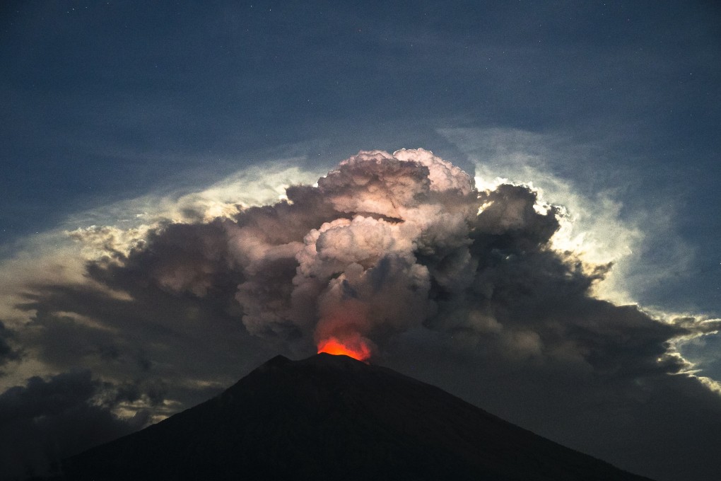 Mount Agung volcano spews hot volcanic ash in June. On Sunday it shot a burst of hot ash into the air. File photo: EPA