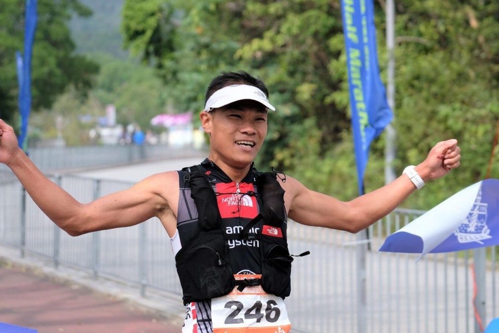 Wong Ho-chung raises his arms at the finish. Photo: HKAAA